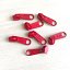 CURSOR PARA CREMALLERA NYLON DE 5 mm ROJO ESCARLATA
